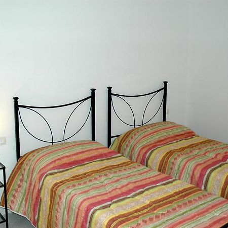 Holiday Homes Stella Marina Сан-Теодоро Номер фото