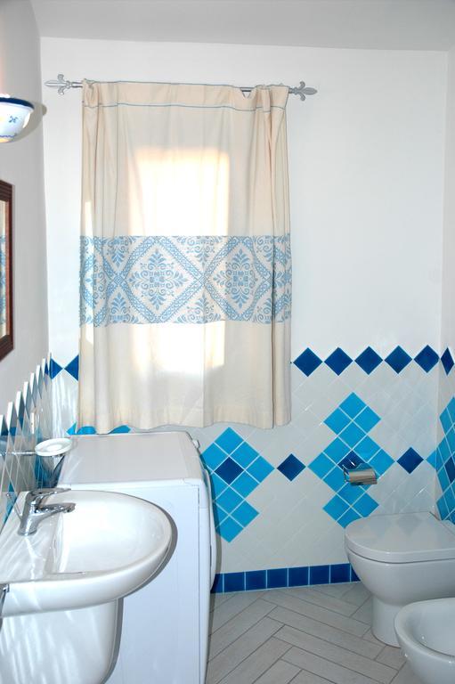 Holiday Homes Stella Marina Сан-Теодоро Номер фото